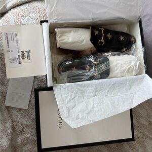 Gucci Black Loafers with Gold Accents